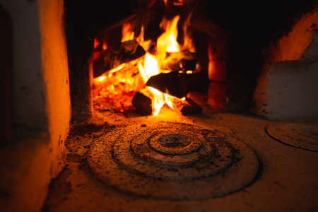 Fire hearth of russian oven in traditional village houseの写真素材