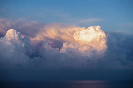 Cumulus storm clouds over the sea, weather forecast, atmospheric frontの写真素材