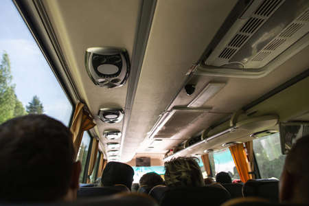 Row of air conditioning system in shuttle bus, making cool fresh air all inside the bus, soft focus