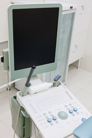 A cuttingedge modern ultrasound machine is prepared and set up for diagnostic imaging in a clinical healthcare settingの写真素材