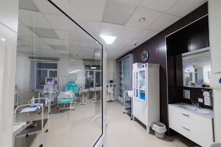 A modern hospital room with advanced medical technology and treatment areas for optimal patient care and comfortの写真素材