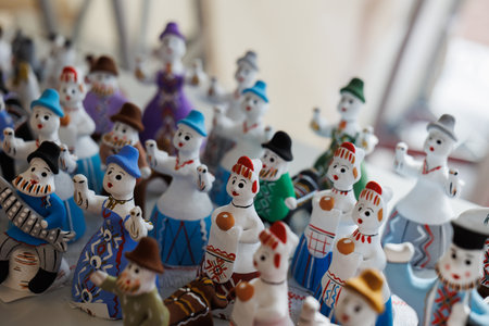 A vibrant collection of beautifully handcrafted snowman figurines that showcase exquisite festive spirit and creativityの写真素材