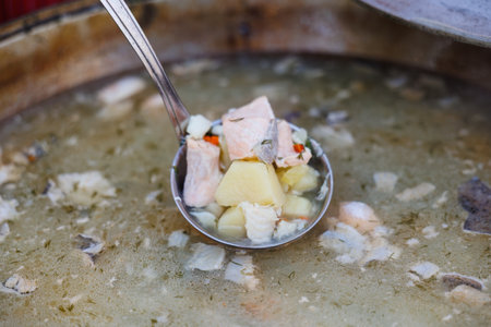 This incredibly delicious bowl of hearty vegetable soup is just perfect for warm meals and cozy gatheringsの写真素材