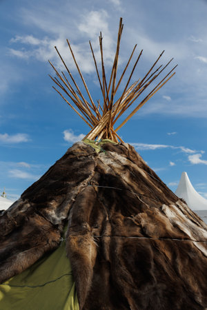 A beautifully crafted teepee, showcasing exquisite traditional design elements, stands proudly...
