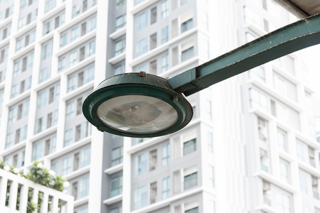 Close up of old rusty green street lampの写真素材