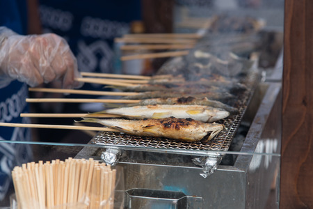 Close up japan fish ayu grill on roasterの写真素材