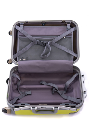 Close up of green luggage on white background isolatedの写真素材