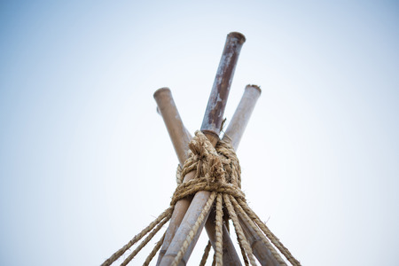 Close up of rope string old bamboo poleの写真素材