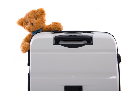 Close up of new white luggage on white background isolated.の写真素材