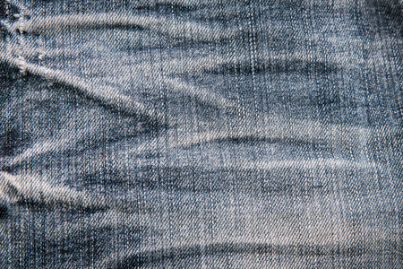 Close up of old wrinkle denim japan jean texture.の写真素材