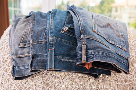 Old japan jean hang on the chair.の写真素材
