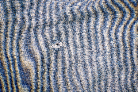Close up of ripped japan denim jean texture.の写真素材