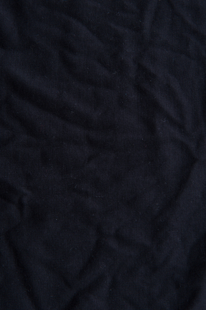 Close up of beautiful wrinkle black fabric texture.の写真素材