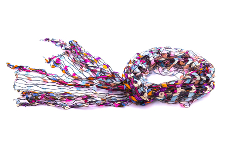 Close up of beautiful multicolor fabric scarf on white background isolatedの写真素材