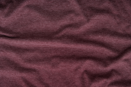 Close up of beautiful wrinkle burgundy fabric texture.の写真素材