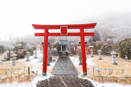 Close up of beautiful red wooden torii in japanese shrine on kumamoto moutain japan.のeditorial素材