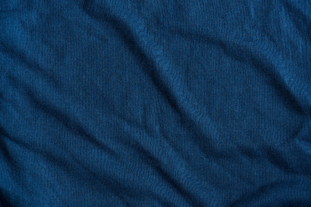 Close up of dark blue fabric textured background.の写真素材