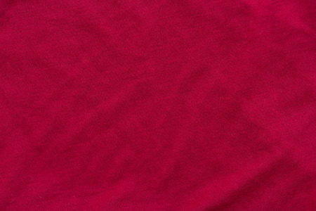 Close of beautiful red wrinkled fabric texture background.の写真素材