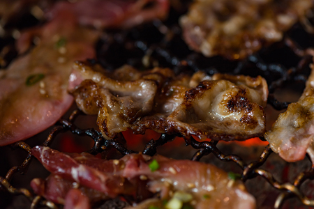 Close up of delicious japanese marinated meat grill on charcoal call yakiniku in japanese restuarant  hida takayama japan.の写真素材