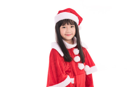 Close up of cute litlle asian girl in santaclaus suit on white background isolated.の写真素材