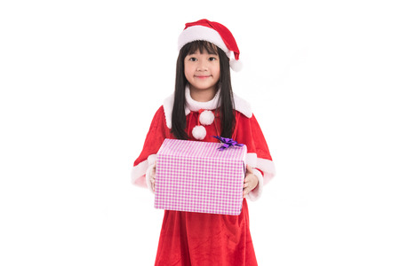 Close up of cute litlle asian girl in santaclaus suit on white background isolated.
