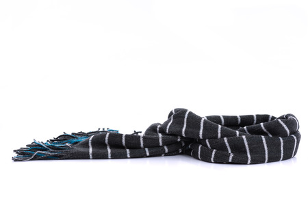 Close up of beautiful dark grey color with white stripe scarf made from cotton fabric on white background isolated.の写真素材