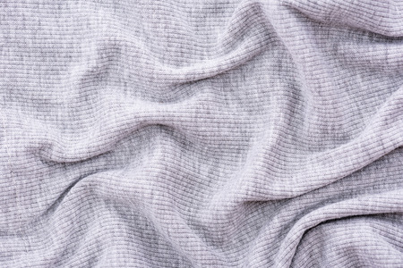 Close up of wrinkled grey cotton fabric texture background.の写真素材