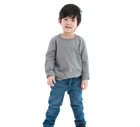 Close up of cute asian boy on white background isolated.の写真素材