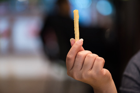 Close up of french fries in local burger shop.の写真素材