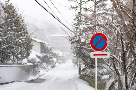 Close up of traffic sign on the road in winter Takayama Japan.の写真素材