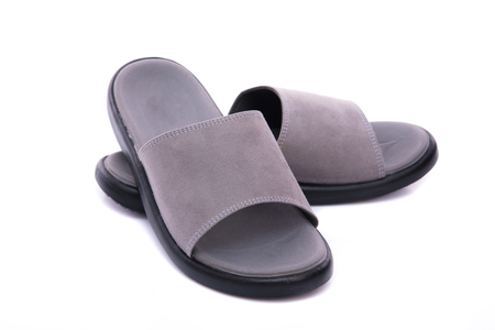 Close up of grey leather sandal on white background solated.の写真素材