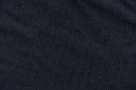 Close up of old dirty wrinkled black bedsheet fabric texture background.の写真素材