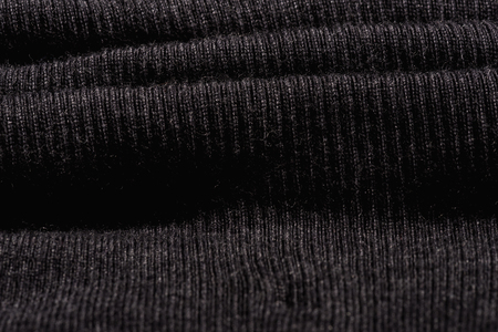 Top view of black wrinkled cotton fabric textured background.の写真素材