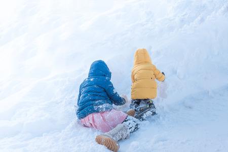 Close up of cute happy asian girl playing snow in winter Aomori Japan.の写真素材
