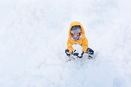 Close up of cute happy asian girl playing snow in winter Aomori Japan.の写真素材