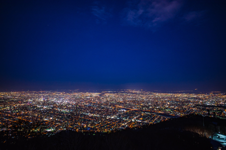Beautiful night cityscape view of sapporo city from moutain moiwa Hokkaido Japan.の写真素材