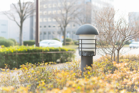Close up of vintage iron lantern in the garden.の写真素材
