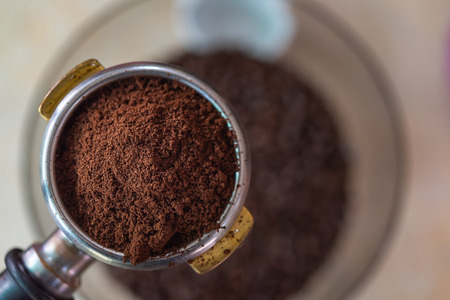 Close up of best quality roast coffee beans import from local farm for brew the pure coffee shot to make variety of beverage.の写真素材