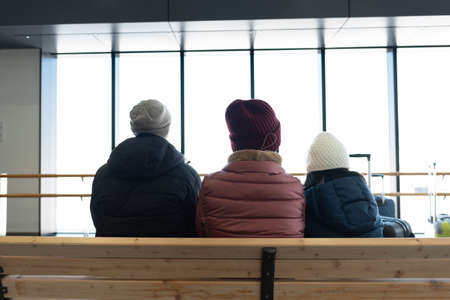 Close up of family waitng at the stationのeditorial素材
