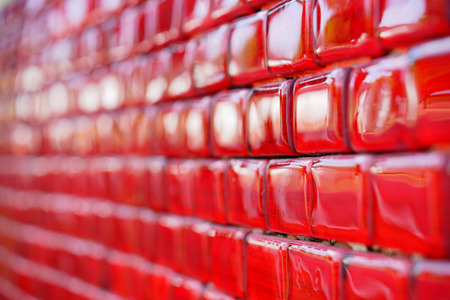 Wall of Red Brick glass line to blurred, selective focusedの写真素材