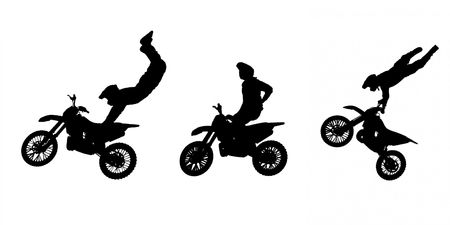 Silhouettes of Motorbike Stuntsの写真素材