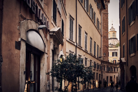 old and romantic street of Romeat sunsetの写真素材