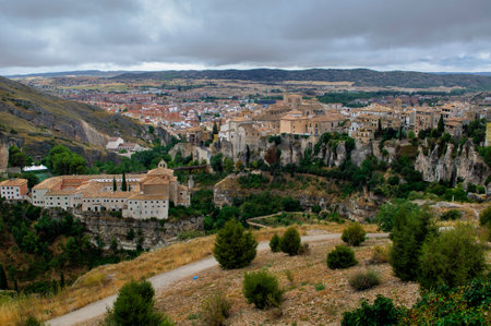 panoramic view of the city of Cuenca, Spain. it is a medieval city built on the top of a cliff surrounded by two riversの写真素材