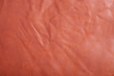 Natural brown leather texture background. Abstract vintage cow skin backdrop design.の写真素材