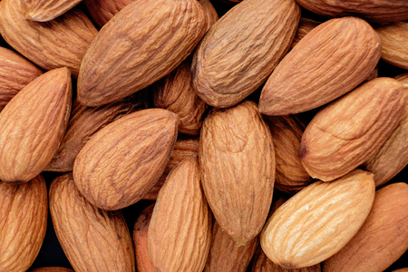 almonds nuts close up food background top viewの写真素材