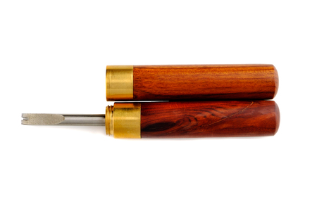 Leather crafting tool - Edge Beveler Skiving and Stitching Grooving Tools isolated on white backgroundの写真素材