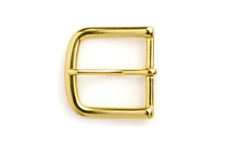 brass or bronze buckle isolated on white backgroundの写真素材