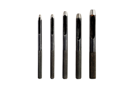 Leather crafting tool - perforating Leather Hole Punches isolated on white backgroundの写真素材