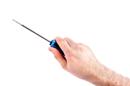 flat screwdriver in hand isolated on white background.の写真素材