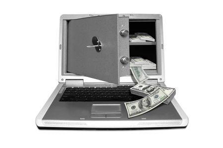 photography with scene of the computer and safe with money to subjects of the work in internet and electronic purseの写真素材